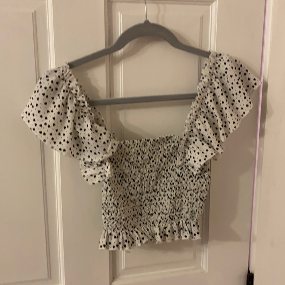 Size xs white top never worn